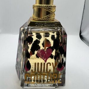 I love Juicy Couture 
3.4 oz
Top is broken as picture
